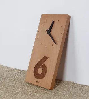 אשור שעון קיר מעץ מלא שעון שעון קיר הסלון אילם חדר שינה מודרני מינימליסטי יצירתי קוורץ שעון