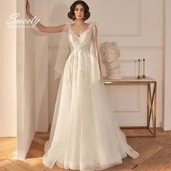 מפואר שמלת החתונה רקום תחרה על הרשת עם קו שמלת נשף מלא השרוול V-צוואר סקסי כלה שמלת כפתור החלוק דה Mariee